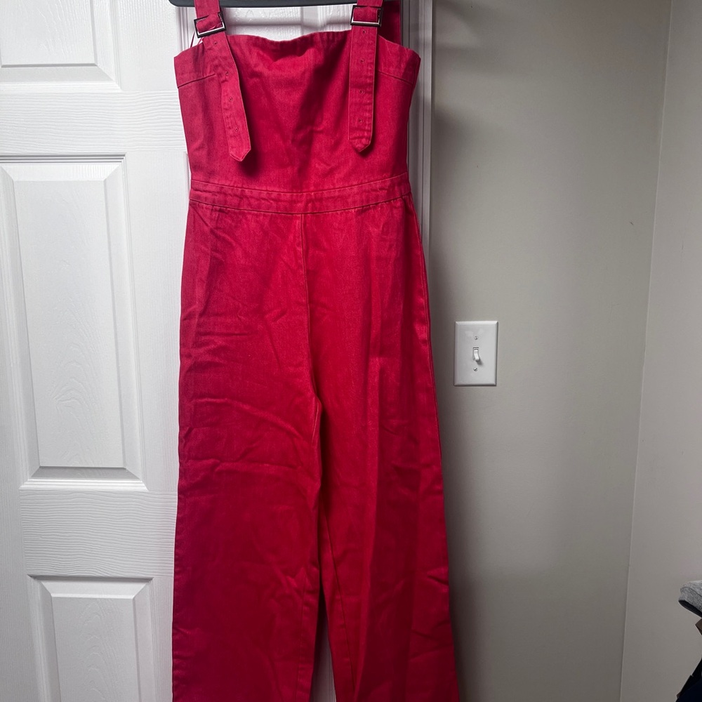 Stylish bubblegum pink Jumpsuit adjustable straps zipper back flare legs